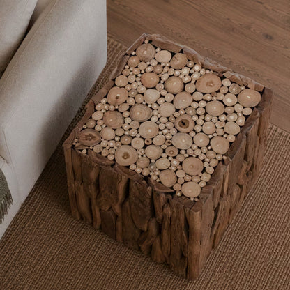 Overhead angled view of the end table's tightly grouped circular wood ends