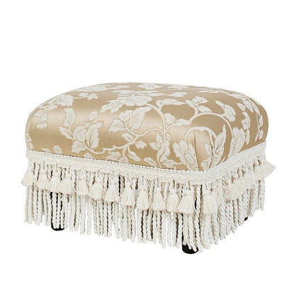Champagne Floral Jacquard Footstool — three-quarter view of the floral footstool and fringe