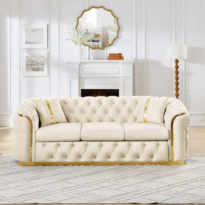 Velvet Chesterfield Sofa with Gold-Tone Trim — beige upholstery option.