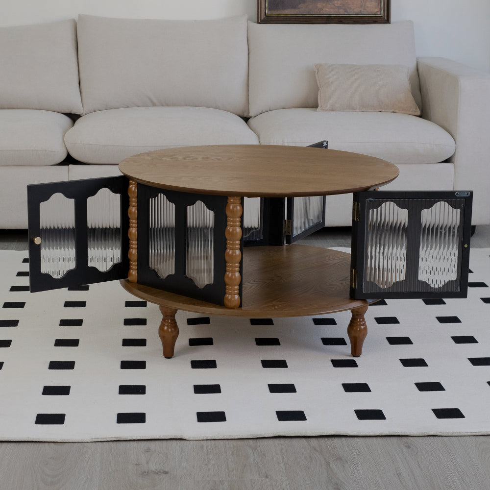Brown round coffee table with three doors open in front of a white sofa