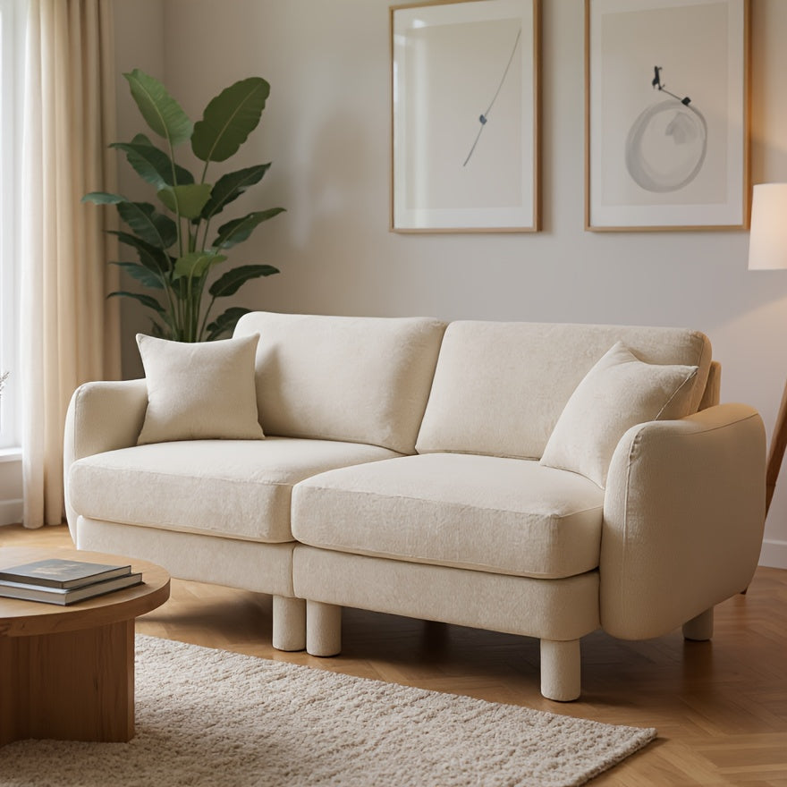 Boucle Modular Loveseat with Rounded Arms — beige loveseat in a warm room.