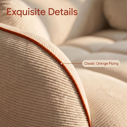 Channel-Tufted Corduroy Lounge Sofa — orange piping detail on white upholstery.