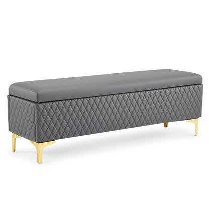 Gray diamond-quilted bench with gold-tone legs on white
