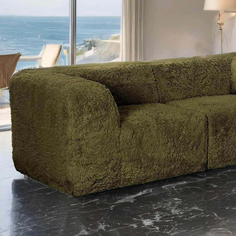 Olive Plush Modular Sofa — rounded arm and plush upholstery detail.