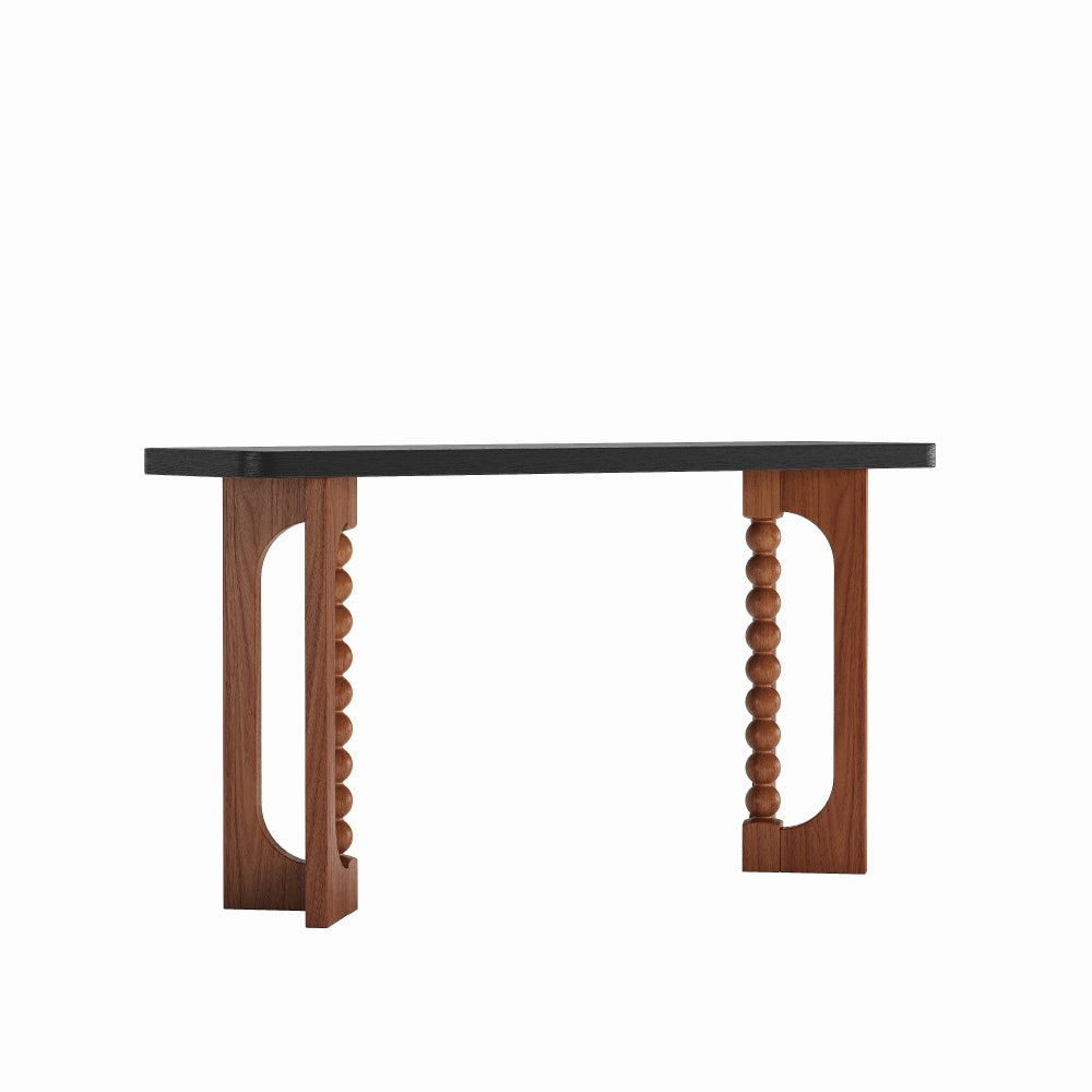 Alternate isolated front view of the console’s two-tone frame and spherical bead details.