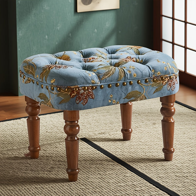 Blue floral stool beside furniture
