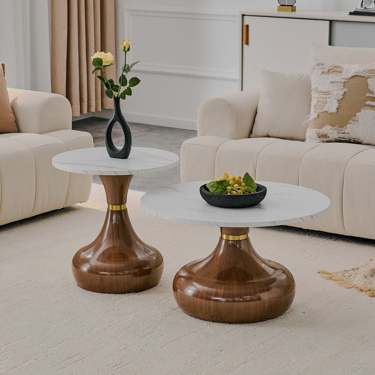 Two faux-marble pedestal tables