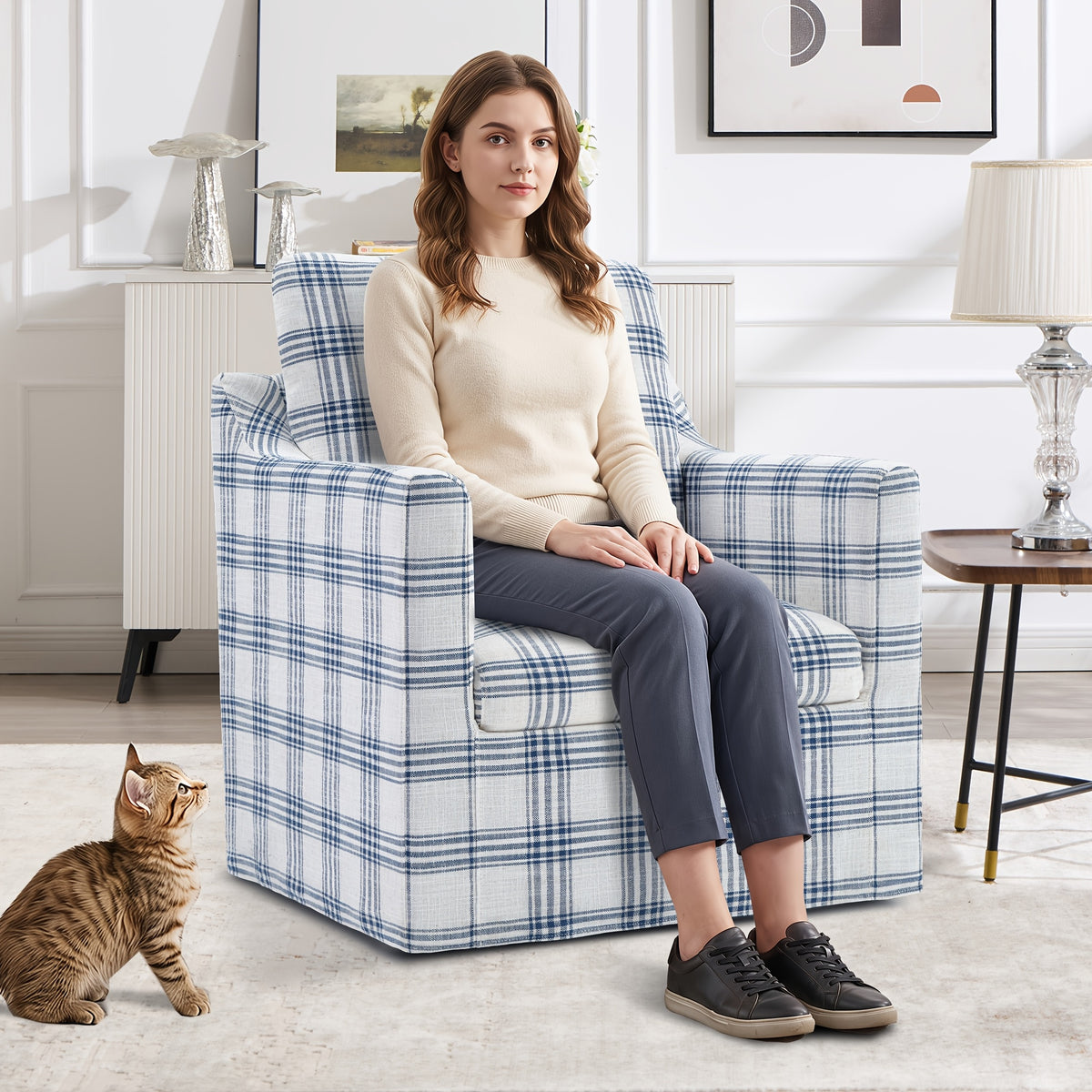 Plaid Swivel Accent Chair — blue plaid chair shown with a seated person
