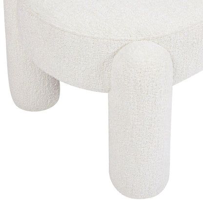 Rounded cream upholstered support on the Hugo bench