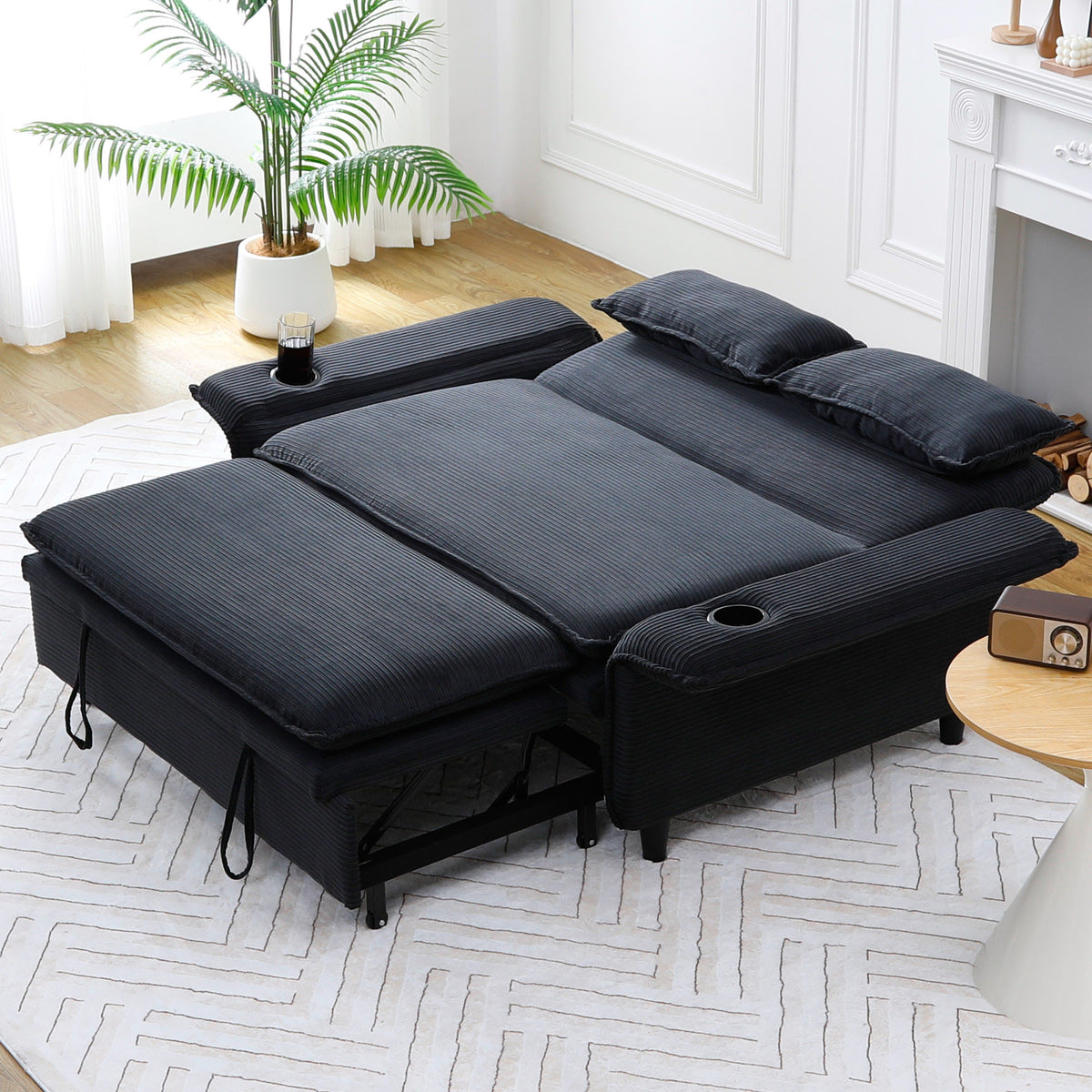 Ribbed Convertible Sleeper Sofa with Cup Holders — sleeper extension with back lowered.