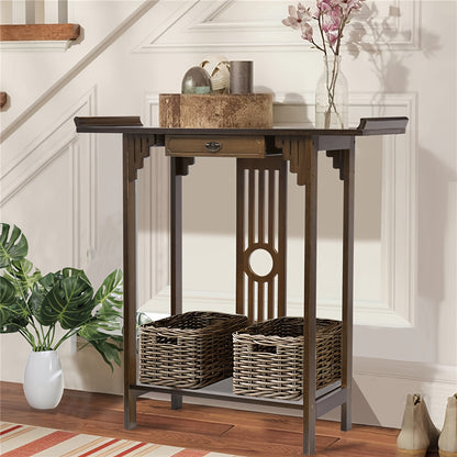 Compact bamboo console with baskets on its lower shelf in an entryway.