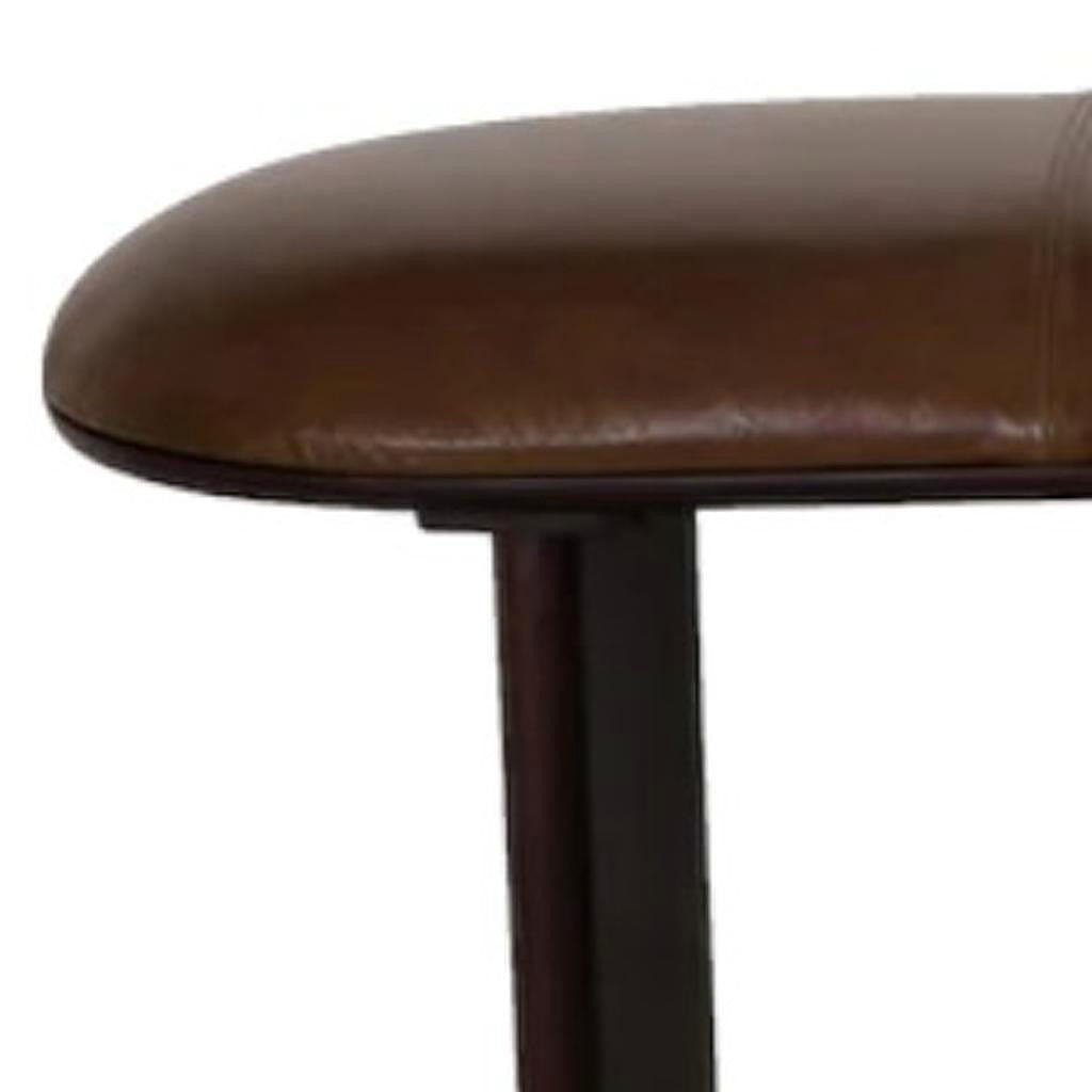 Dark panel support beneath the brown upholstered bench