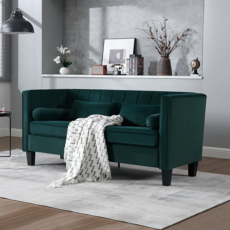 Cohaven Velvet Loveseat with Bolster Pillows — green loveseat three-quarter view.