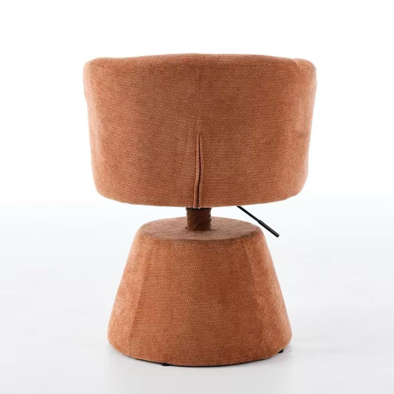 Rear view of the terracotta chair showing its back seam