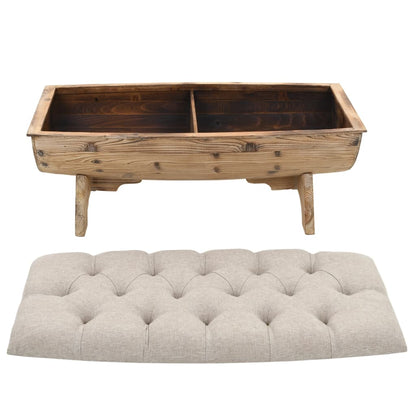 Wood storage bench with its upholstered lid removed to show two interior compartments.