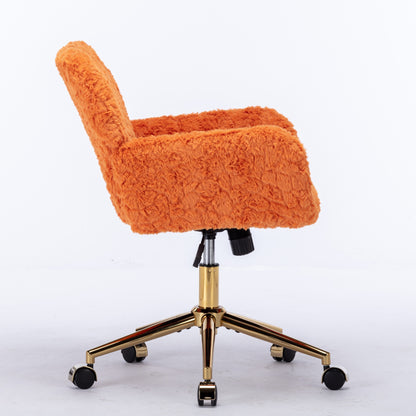 Side view of the orange desk chair on a white background