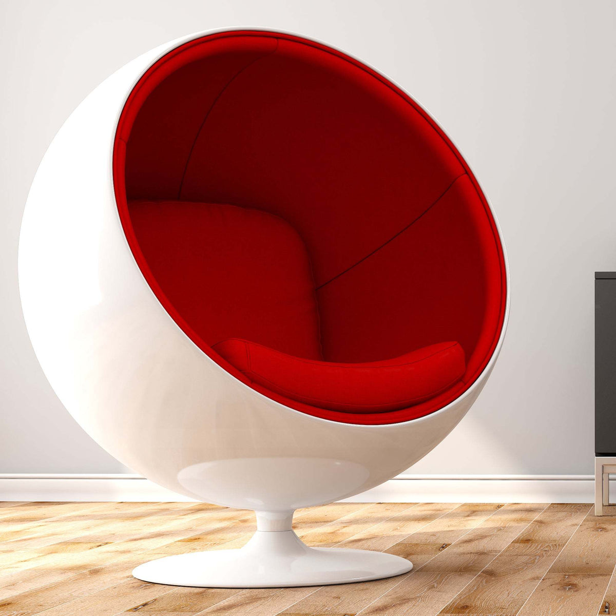 White-shell red-lined Globe chair in room
