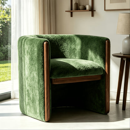 Textured Barrel Chair with Wood Trim — green front three-quarter view by a window