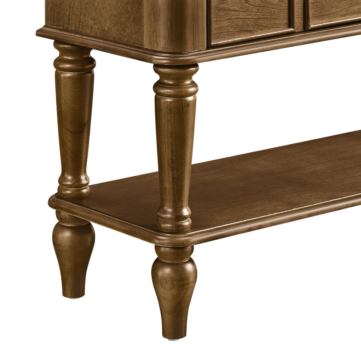 Close view of the walnut console turned legs, lower shelf edge and rounded cabinet corner