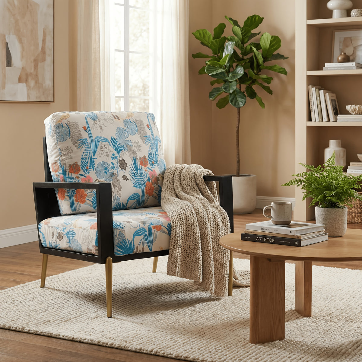 Blue and Orange Floral Velvet Accent Chair — blue floral chair with a throw in a living room