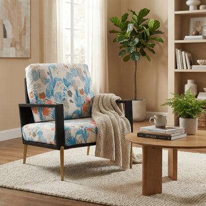 Blue and Orange Floral Velvet Accent Chair — blue floral chair with a throw in a living room