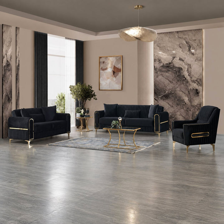 Black velvet Melody sofa, loveseat and chair with gold trim in a living room