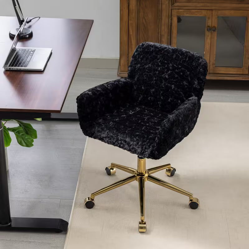 Black upholstered swivel chair viewed at an angle from above