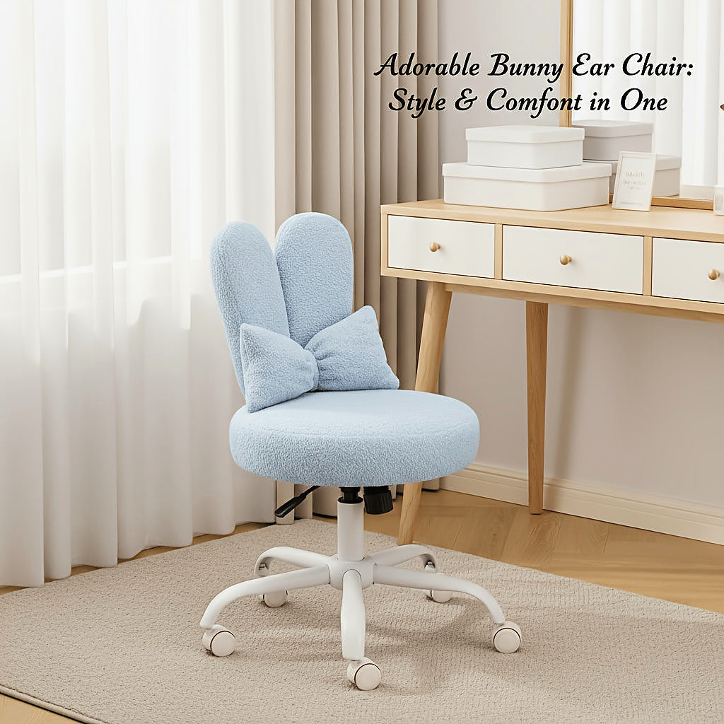 Light blue bunny ear vanity chair with a bow cushion and white rolling base