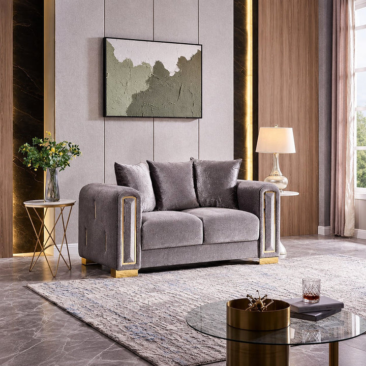 Impreza silver loveseat with gold-tone accents in a contemporary living room