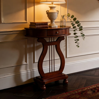Angled room view of the cherry brown console showing its semicircular tabletop and single drawer.