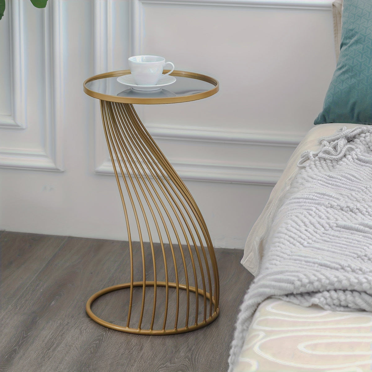Angled gold-tone rod table