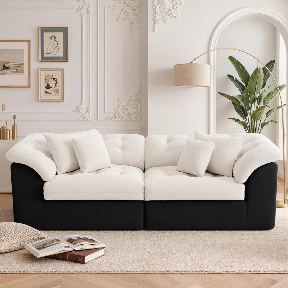 Contrast Modular Cloud Sofa — ivory cushions with black upholstered base.