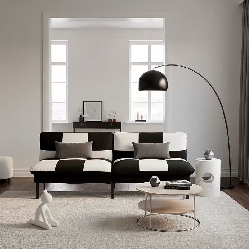 70-Inch Checkerboard Velvet Split-Back Futon — upright checkerboard sofa in a living room