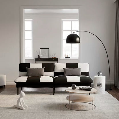 70-Inch Checkerboard Velvet Split-Back Futon — upright checkerboard sofa in a living room