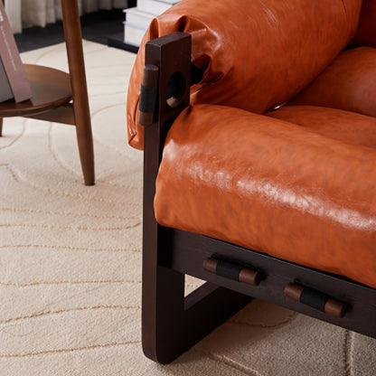 Leather-Look Accent Chair with Wood Frame — arm attachment and seat close-up