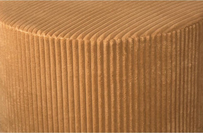 Close-up of the ottoman's ribbed corduroy top and side