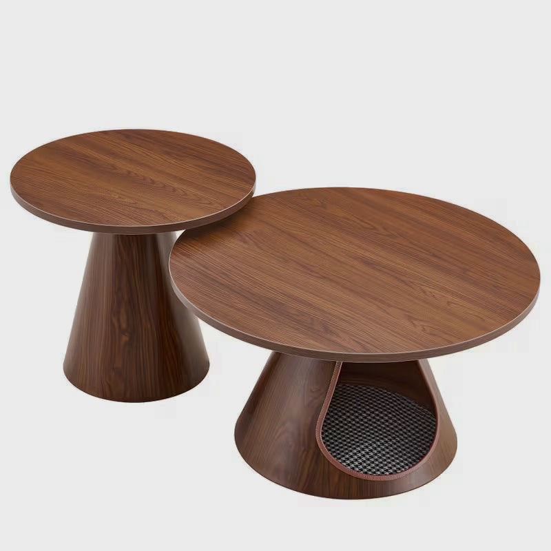 Two round walnut-look nesting tables on a white background, one with an open cat cubby