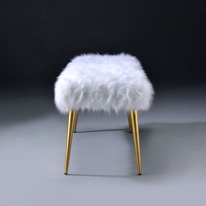 End profile of the white faux-fur-style bench with slim gold-tone legs