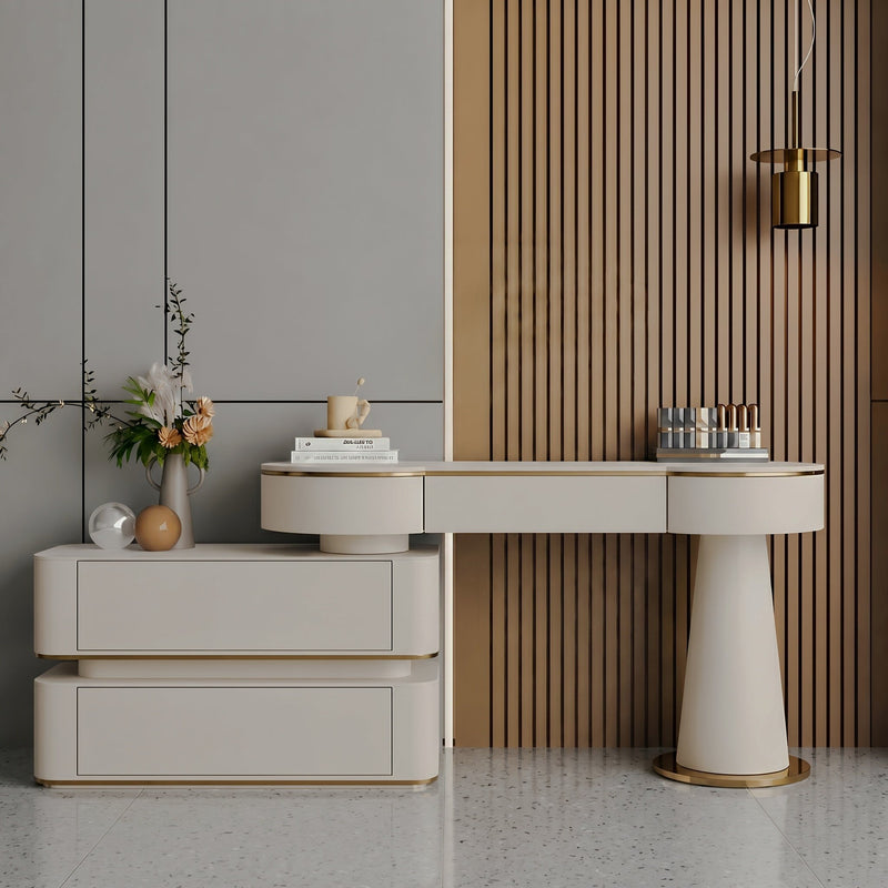 Cream dressing table and matching two-drawer chest with rounded edges and gold-tone trim
