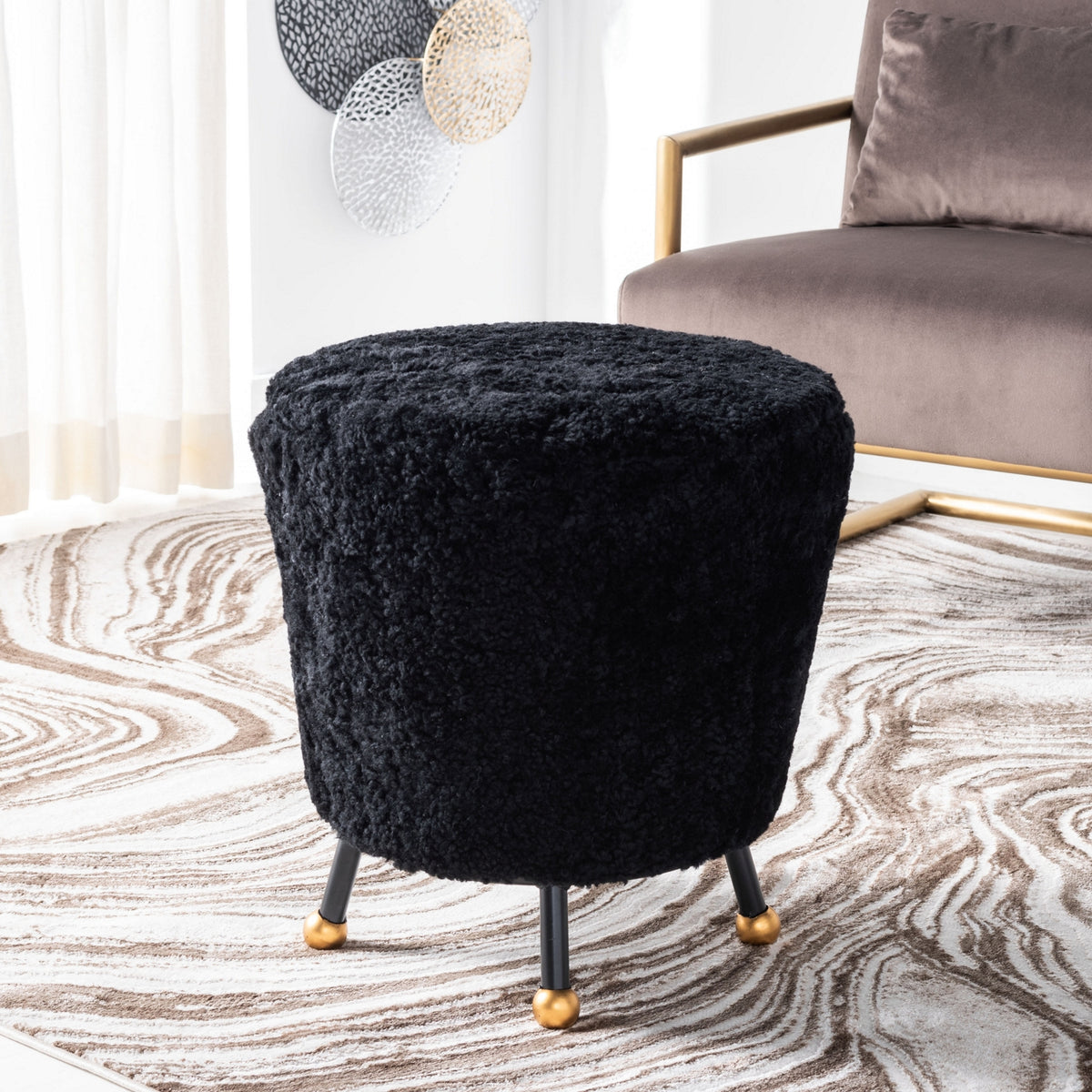 Oriana Black Shag Ottoman — black shag ottoman in a living room