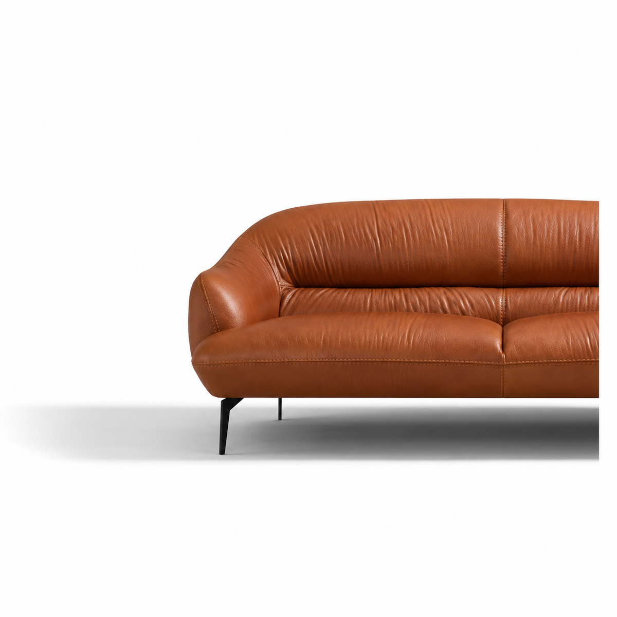 Leonia Cognac Sofa — left upholstery and arm detail.