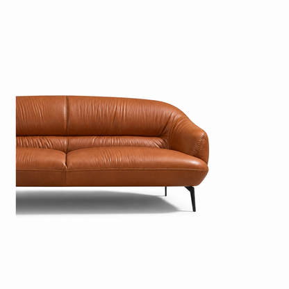 Leonia Cognac Sofa — right upholstery and arm detail.