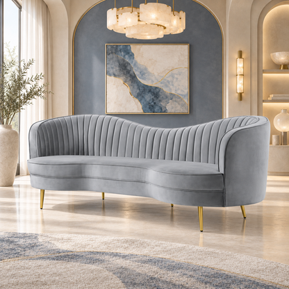 Grey Channel-Tufted Sofa with Gold-Tone Legs — grey sofa in a luxury room.
