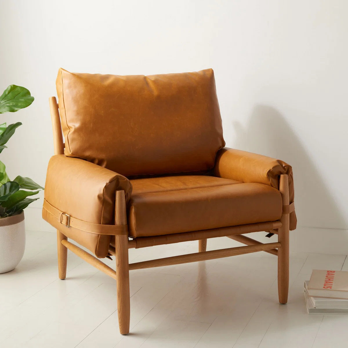Strap-Detail Wood-Frame Accent Chair — caramel chair three-quarter view