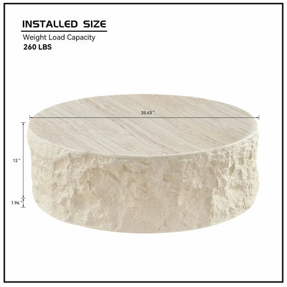 Dimension graphic of a low round cream table with rough stone-look sides