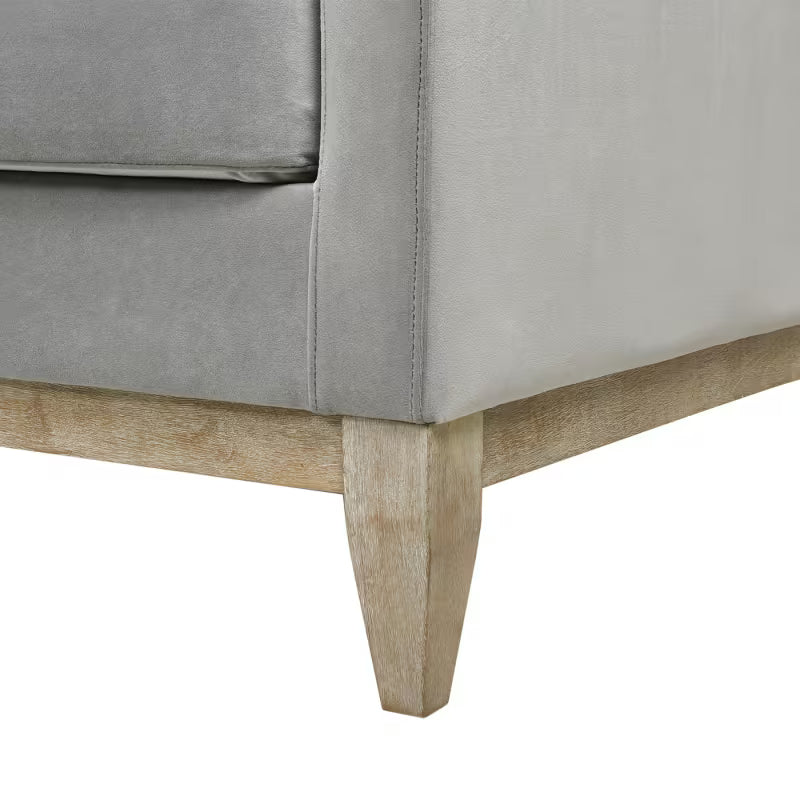 Knox Opal Grey Velvet Sofa — wood base, leg and upholstery seam detail.