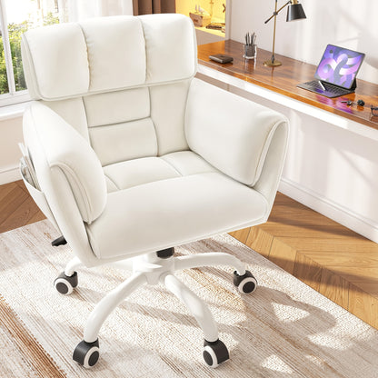 White padded swivel chair beside a desk