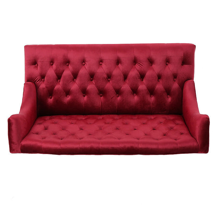 Elevated view of the wine red loveseat showing button tufting across the back and seat.