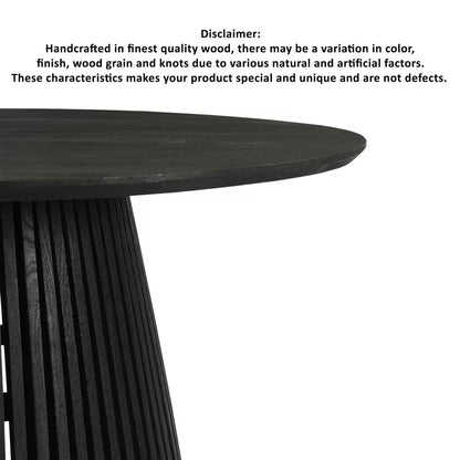 Close-up of the black tabletop and slatted base with a natural-variation note