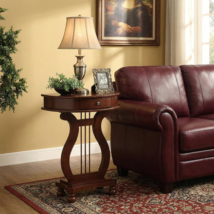 Compact harp-base console placed beside a living room sofa.